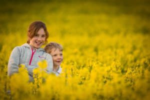 Children amongst the rape seed, sussex