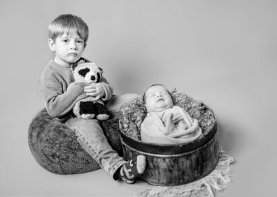 Newborn photography session with big brother